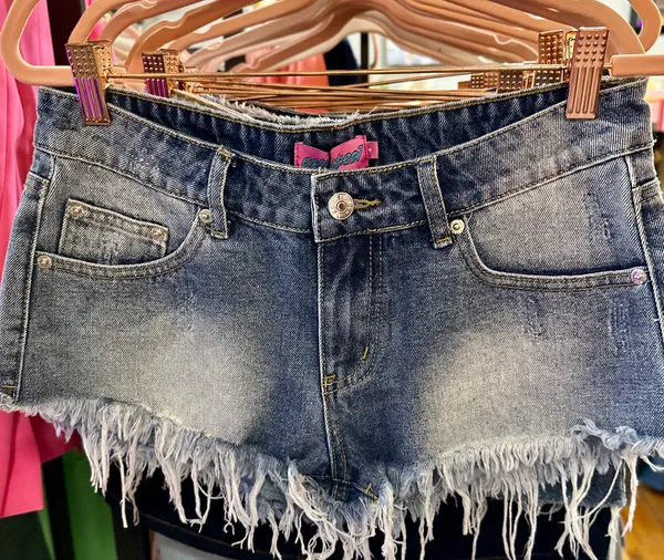 Edikted Medium Wash Jean Shorts - Image 5
