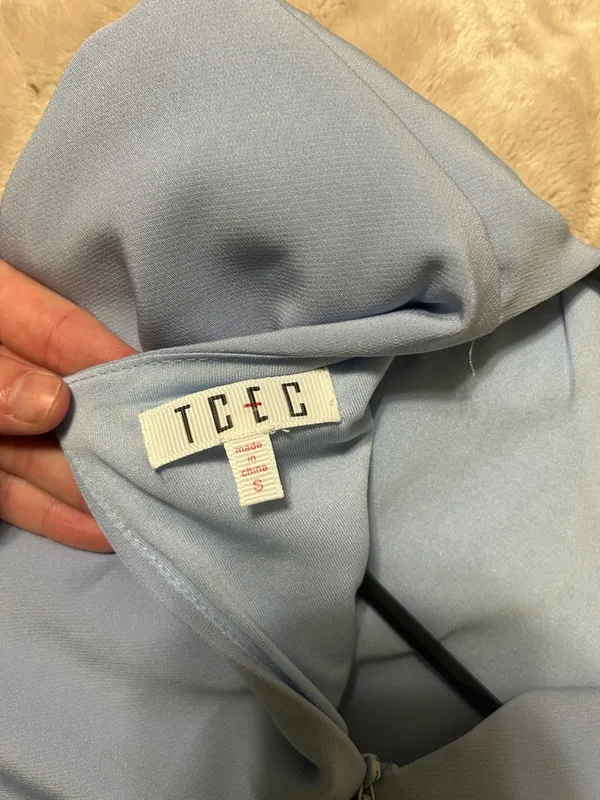 TCEC Light Blue Sleeveless Romper with Back Tie Accent - Image 2