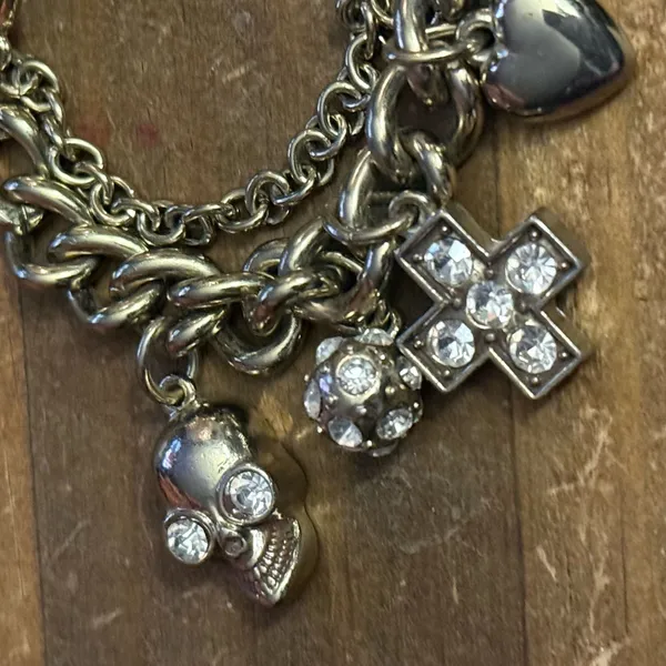 Chunky silver tone crosses, hearts and skulls charm bracelet - Image 3
