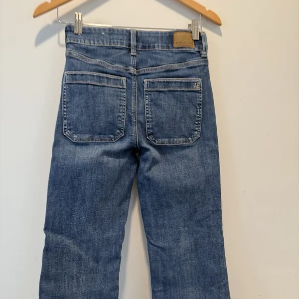 American Eagle Super Hi-Rise Flare Jeans Women Sz 4 Long Patch Pockets Cut Hem - Image 5