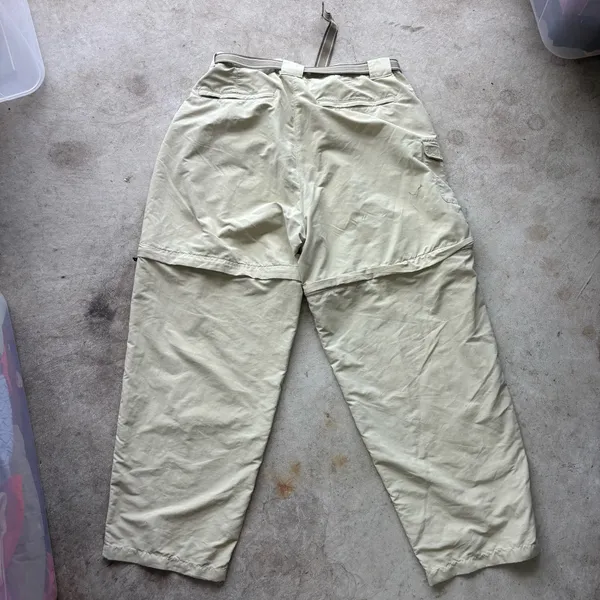L.L. Bean convertible cargo hiking pants feature a built-in webbed belt and zip-off lower legs. - Image 6