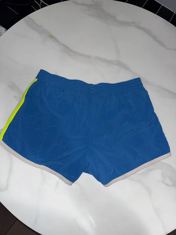 Brooks Women's Blue Running Shorts with Mint Panels and Cream Trim - Image 2