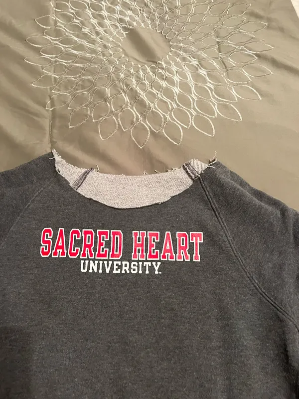 Adidas Cozy gray sweatshirt featuring Sacred Heart University logo in red and white. - Image 2