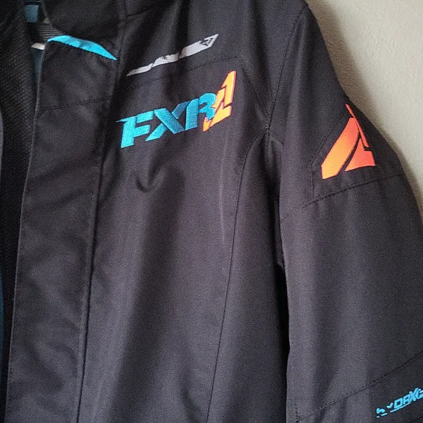 FXR Women's Ski & Snow Jacket in Black with Blue and Orange Accents - Image 2