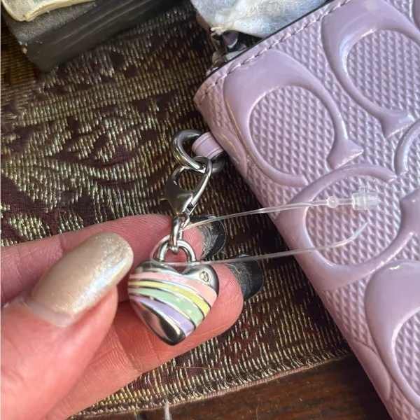 Authentic COACH patent signature leather zip top wristlet with a heart charm - Image 6