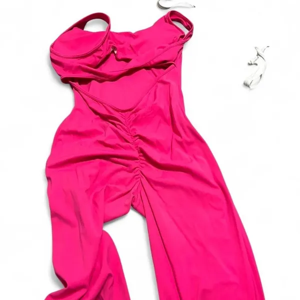 Pink flare jumpsuit with‎ stretchy fabric - Image 5