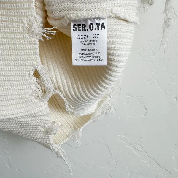 Ser.o.ya | Everleigh‎ Distressed Knit Off-Shoulder Mini Dress in Winter White - Image 8