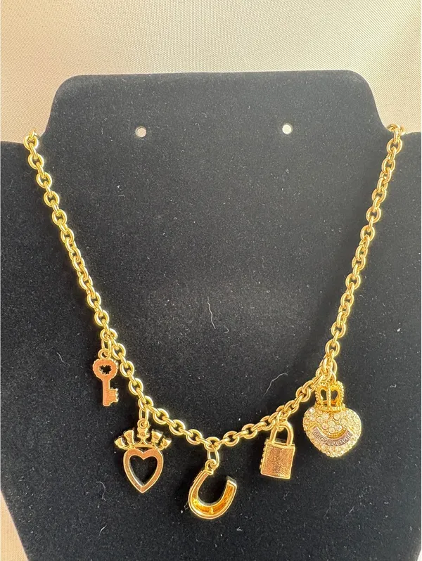 Juicy Couture Gold Tone Charm Necklace with Heart, Key, Lock, and Horseshoe Pendants - Image 2