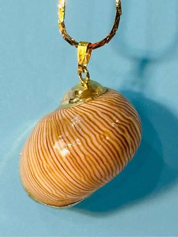 Gold Layered Necklace with Beige Swirl Pendant - Image 2