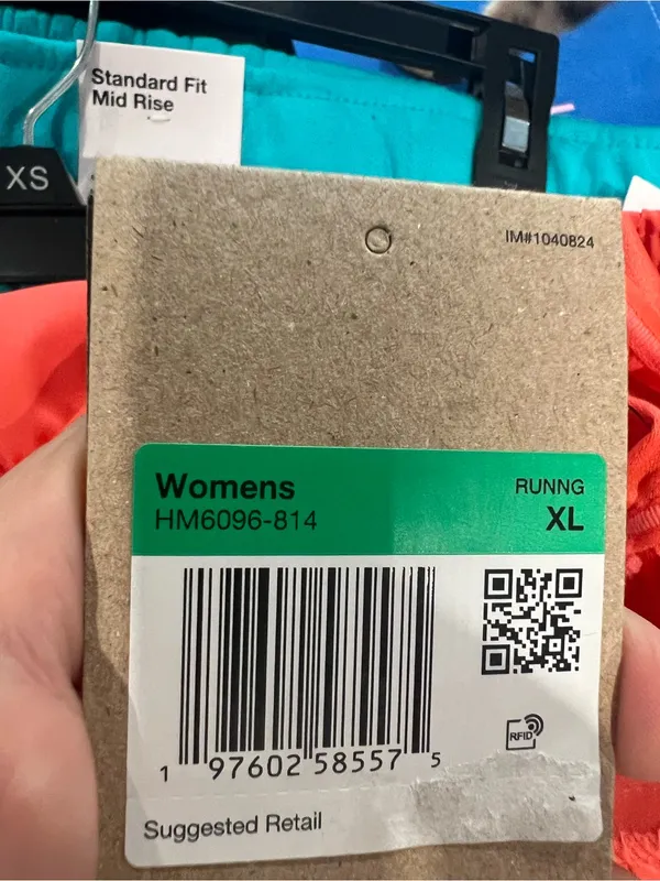 Nike Women's Coral Athletic Shorts with White Swoosh - Image 7