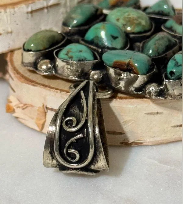 Turquoise cluster pendant set in Tibetan Silver. 14 nuggets, 2”x2” - Image 6