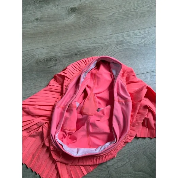 EUC Women Lululemon Pleat To Street Skirt II Grapefruit neon tennis skirt Size 8 - Image 9