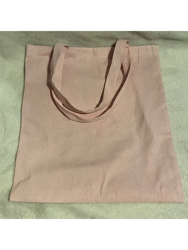 Pink Graphic Canvas Tote Bag with Skull/Books and Smut quote - Image 2
