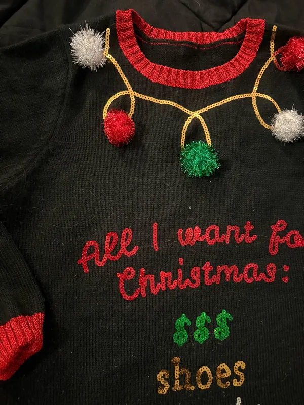 Black Christmas Sweater Dress with Festive Pom-Poms and Multicolor Sequin Text - Image 3