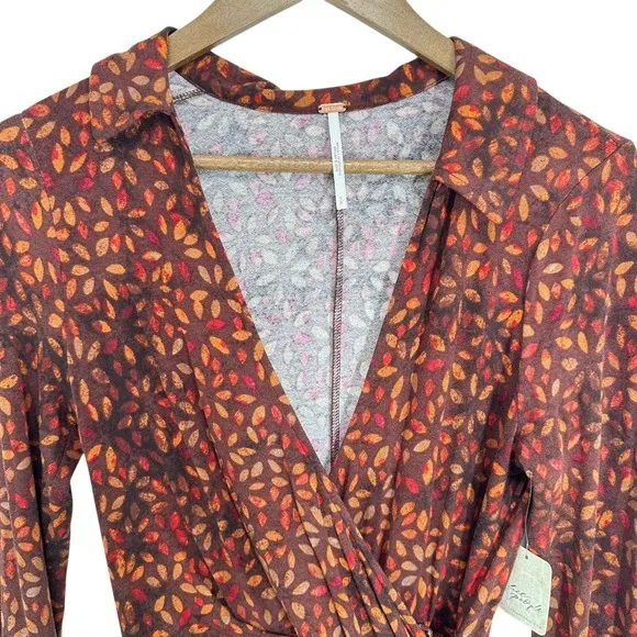 Free People Revolve Shayla Wrap Midi Dress‎ Brown Floral Long Sleeve Midi Dress - Image 4