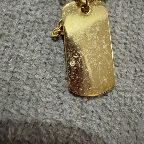 Delicate Gold Necklace with Floral Pendant - Image 5
