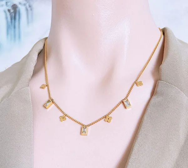 Dainty Clovers & CZ Charms Gold Necklace - Image 9