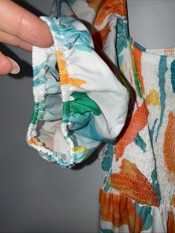 Smocked Puff-Sleeve Midi Dress in White with Orange & Teal Print - Image 5