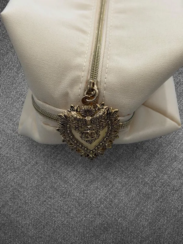 Dolce & Gabbana Devotion Cream Cosmetic Pouch With Gold Heart Charm - Image 2