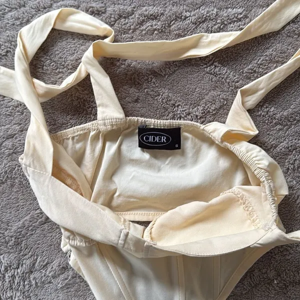 Cider bandeau.  Size Small. Zip closure on side. Straps tie into bows. - Image 5