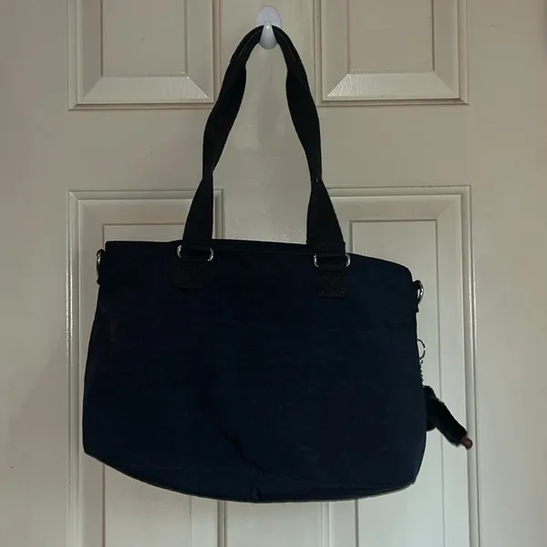NOT FOR SALE. Kipling black bag with keychain , and extra strap. - Image 4