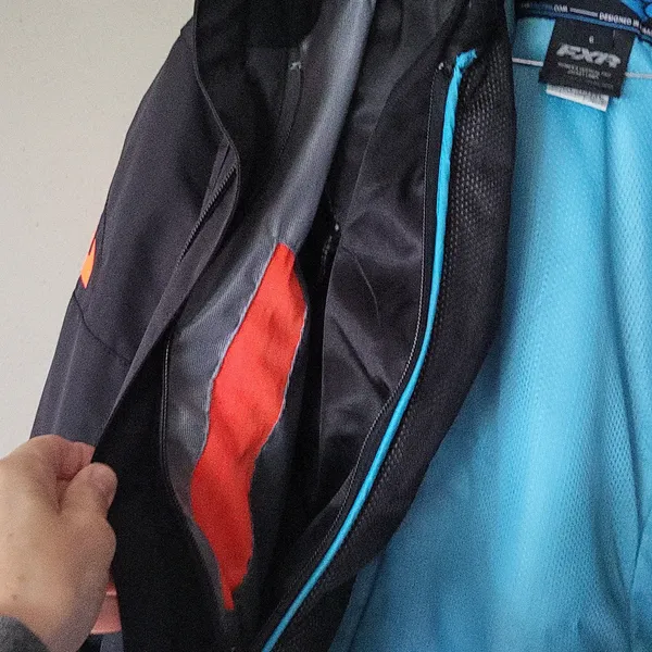 FXR Women's Ski & Snow Jacket in Black with Blue and Orange Accents - Image 7