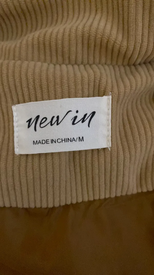 New In Jacket - Image 3