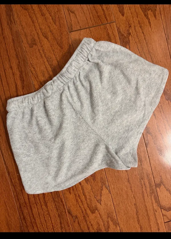 Colsie light gray terry fleece lounge shorts - Size XS. light gray terry fleece lounge shorts feature a comfortable elastic drawstring waistband, curved dolphin hem, and side pockets. Gently warn and in excellent condition. Measurements approximately 11” not fully stretched out from elastic waste x 10” long. Non smoking home. priced to sell at as is condition. Don’t like my price, make reasonable offer! And thank you for checking my closet. - Image 3