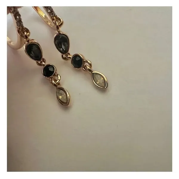 Gold tone hoop earrings with dangling rhinestones - Image 6