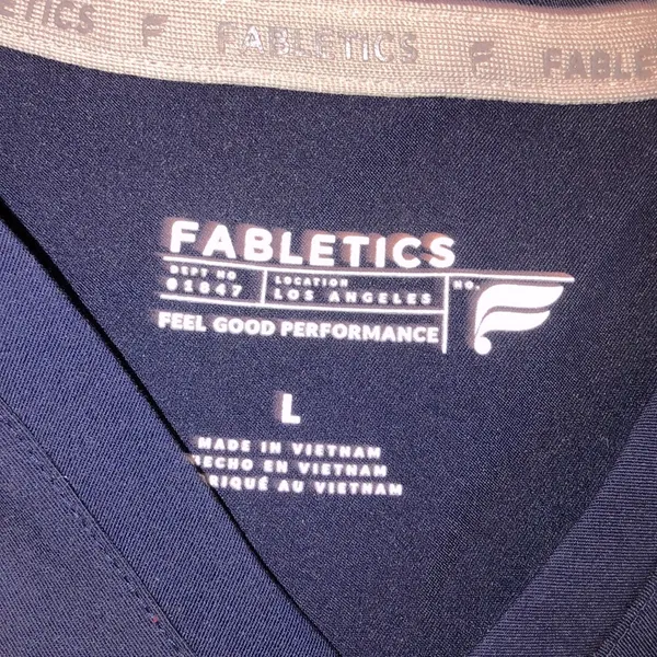 Fabletics navy blue  nurses scrub top size large - Image 2