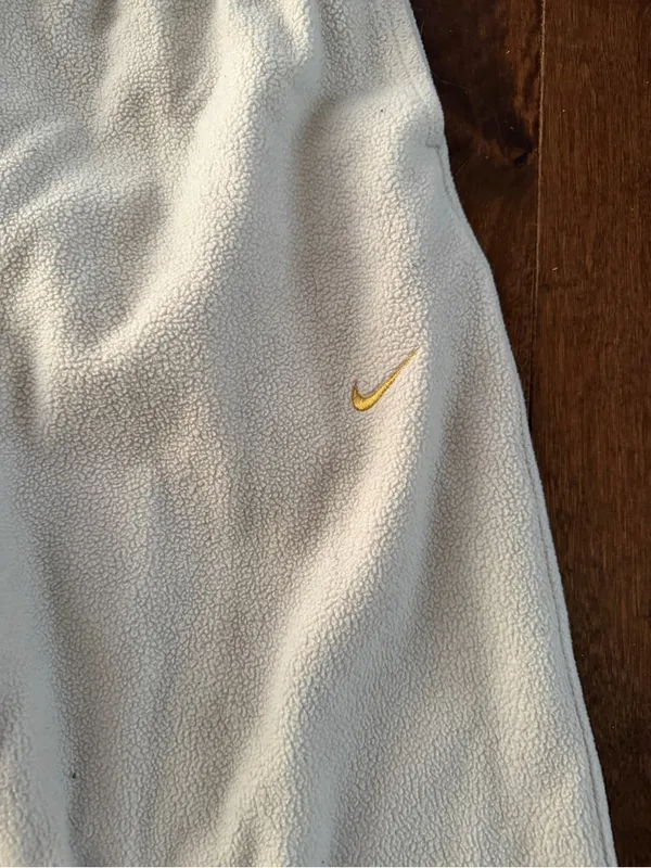 Nike Woman’s size Med Cream Sweatpants with Gold Swoosh Accent - Image 2