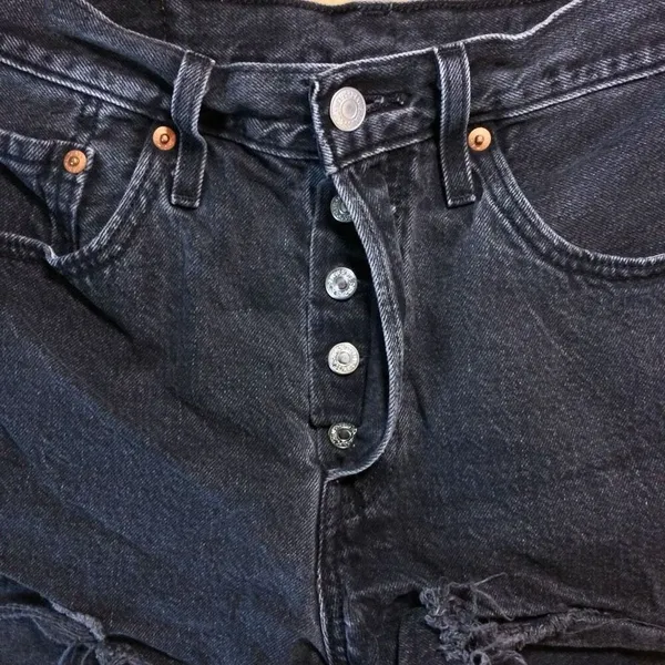 Levi’s 501 raw hem black button fly shorts 27 - Image 5