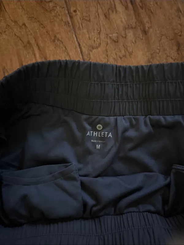 Athleta Navy Athletic Shorts with Neon Yellow Trim - Image 2