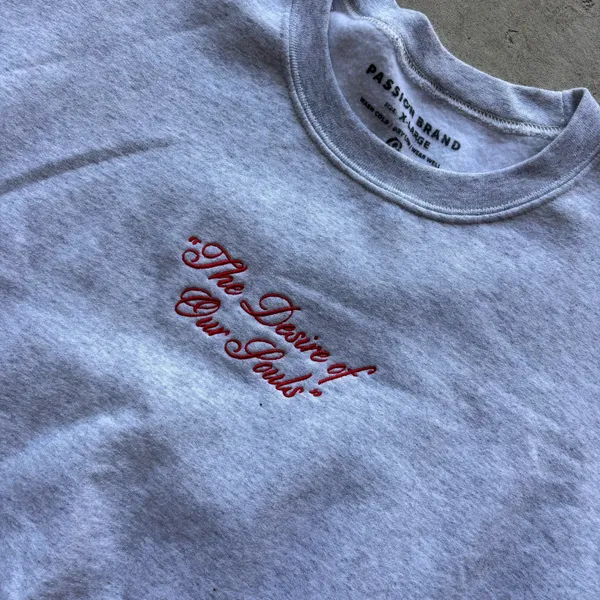 Passion Brand crewneck sweatshirt features a distinct red embroidered cursive script reading "The Desire of Our Souls" across the chest - Image 2