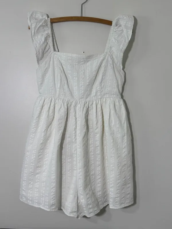 American Eagle cream romper with a tassel tie - Image 2