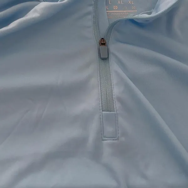 Baby blue long sleeve quarter zip athletic top in a women's size Large - Image 3