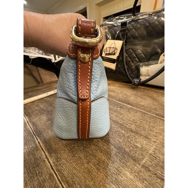 light blue Dooney & Bourke Pebble Grain Mini Domed Crossbody Brown Leather Trim - Image 5