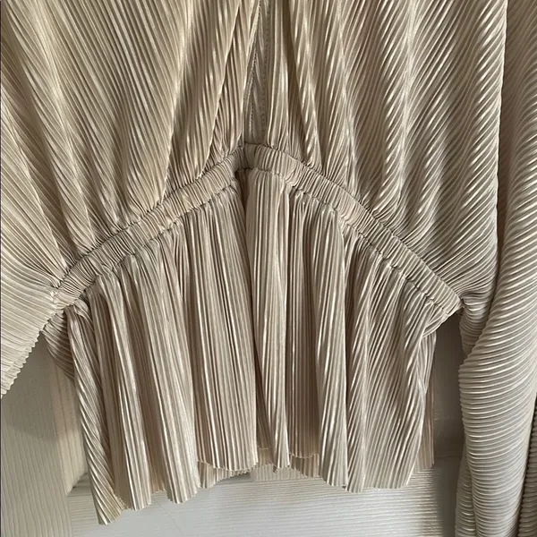 Cream Blouse with V-Neckline and Pleated Peplum - Image 4