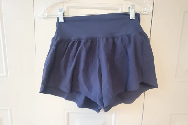 Bundle of XS's and smalls exercise workout shorts in black and navy blue. - Image 3