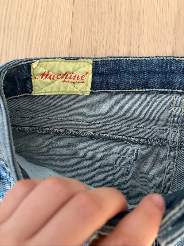 Machine distressed crystal embellished low rise denim jeans - Image 7
