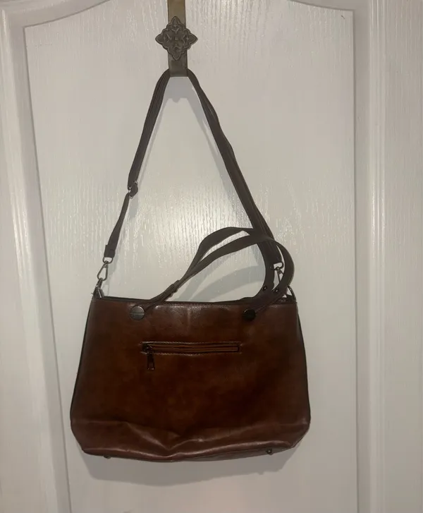 dark brown faux leather multi-pocket tote handbag featuring dual top handles and vertical front zipper pockets - Image 3