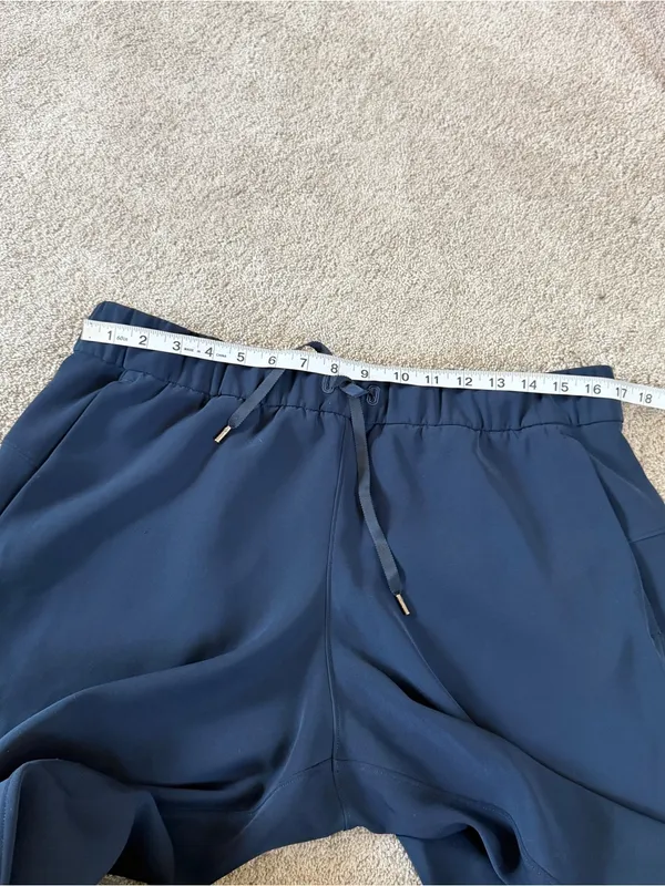 Lululemon Women’s On The Fly Jogger Pants Wrinkle-Free in True Navy 12 - Image 11
