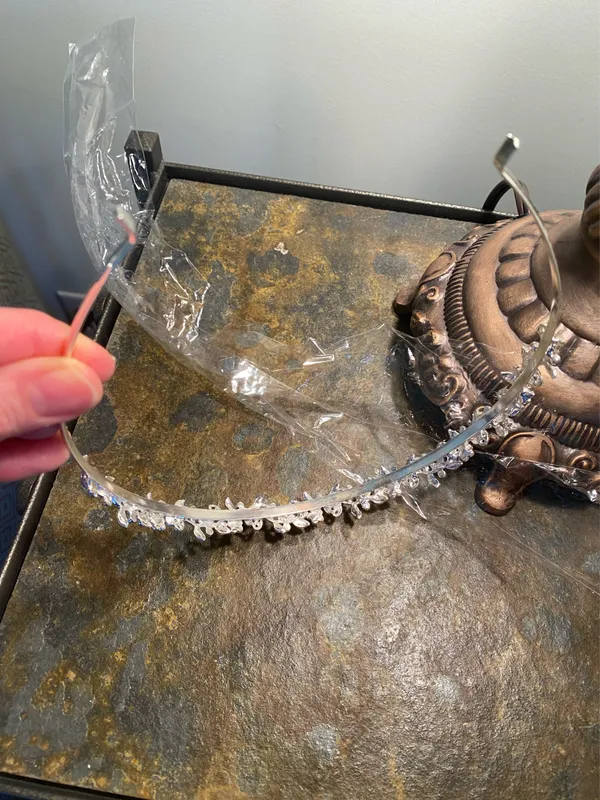 Silver metal headband with flowers and rhinestones on a vine - Image 5