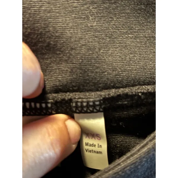 Athleta Black Knit Mini Skirt XXS Stretchy Tiered Seam Front Zip Pockets - Image 3