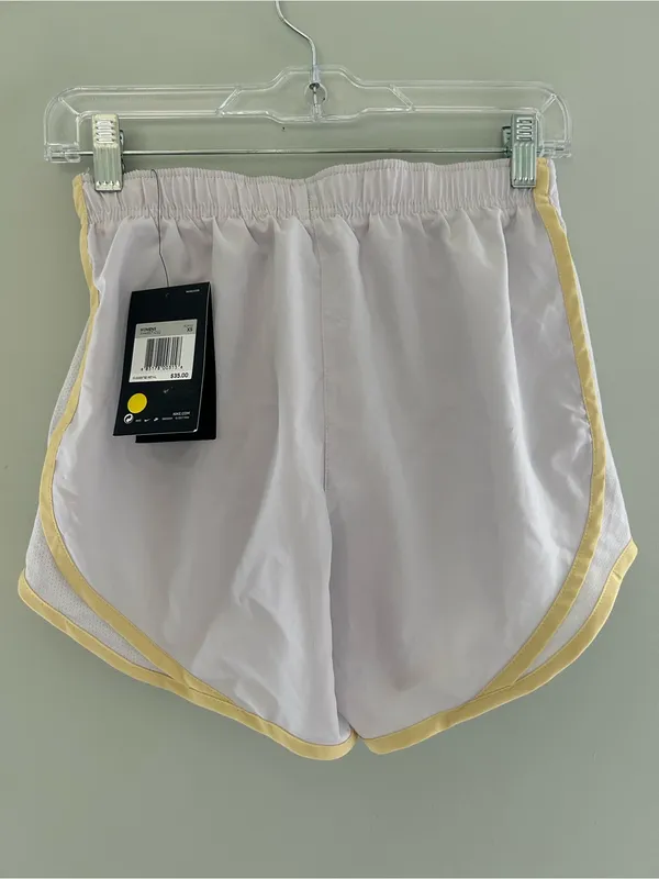 Nike Women’s Light Gray Athletic Shorts with Yellow Trim - Image 2