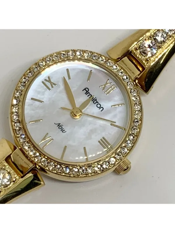 Armitron women’s watch gold tone 24mm mop dial quartz rhinestones running - Image 2