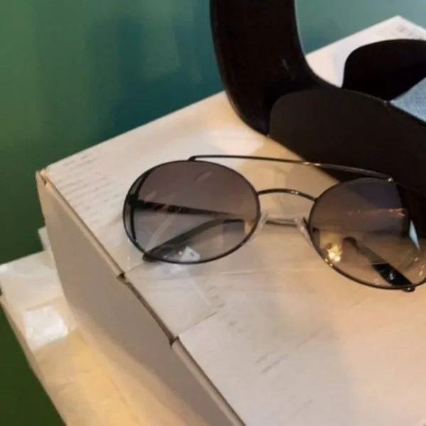 Prada 61mm Oval Sunglasses silver - Image 6