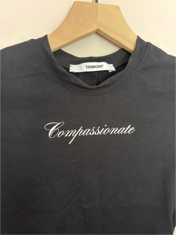 Tank Air Compassionate Black Baby Tee - Image 3