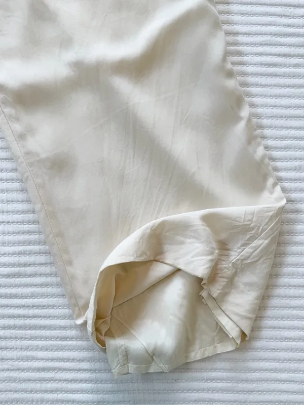 100% Silk High-Waist Wide Leg Lined Pants in Ivory with Mother of Pearl Buttons - Image 7