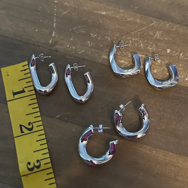 Set of three silver tone chunky link hoop earrings - Image 3